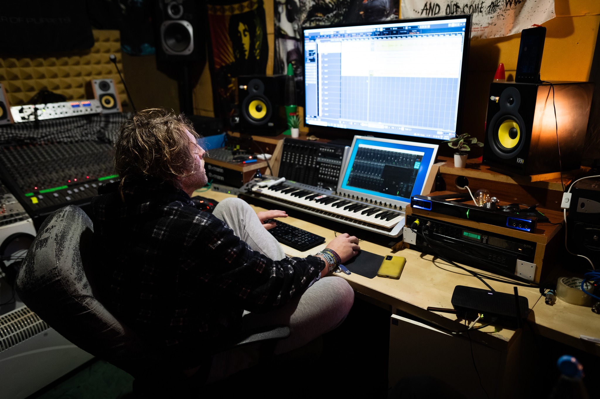 Working on music at the studio desk